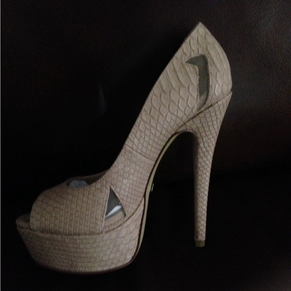 Bebe ivory colored high heels. New with tags. Size 7. Never worn